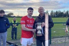 Ballygarvan-Captain Ray O'Halloran receiving the Padoe Cronin Cup from Myles BarryJAFC