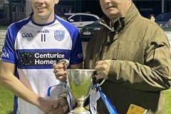 Eoin O'Donovan receiving Conchúr Ó Murchú Cup