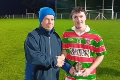 Tracton's Cathal Lowney was named Man of the Match & received his award from sponsor Declan O'Neill.