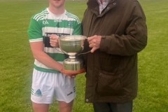 Valley-Rovers-Junior-Hurling-Captain-Jason-Cronin-receiving-JAHL-trophy-from-Myles-Barry